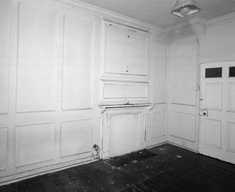 Interior. Third floor panelled bedroom