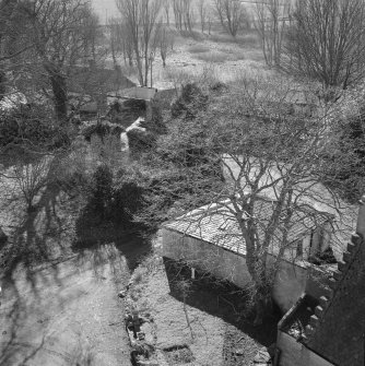 View from roof S showing cottage and former stables