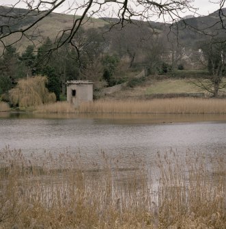 Distant view from S with loch