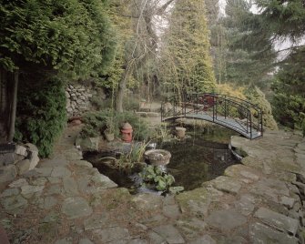 View of pond and bridge