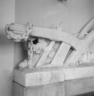 Interior. Detail of marble sculpture showing plough