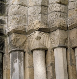 West doorway, detail of capitals on N side of doorway