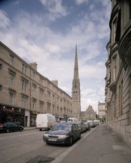 View from S showing spire and halls