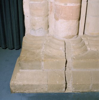 Interior. Detail of chancel arch base showing slot