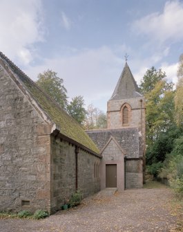 View from NE showing spire and side entrance