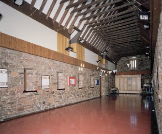 Interior. Barn Hall, View towards unused high level entrance door.