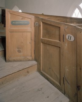 Interior. Detail of gallery pews with nameplate " ELSHIESHIELDS"