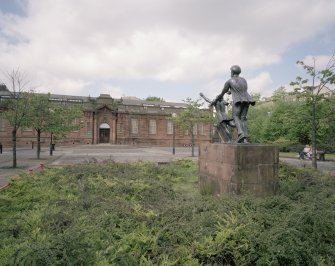 View from ESE showing entrance with statue to right