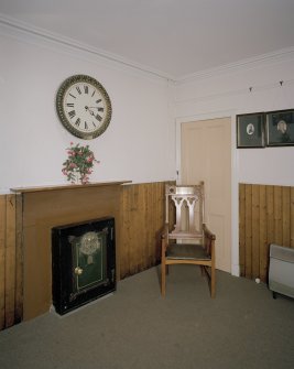 Interior. Session room showing fireplace with inset safe