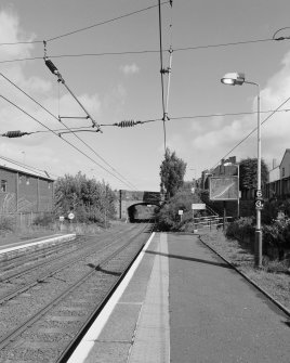 View of Thorn Brae road overbridge and E end of platforms from WSW.