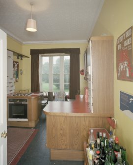 Interior. First floor. Private or family kitchen with 1970's units