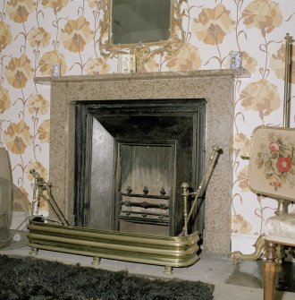 Interior.  Second floor. Principal guest bedroom. Detail of fireplace