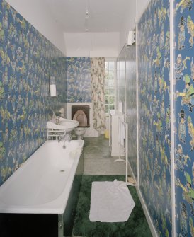 Interior.  Second floor. '1970's military cartoon wallpaper bathroom'