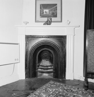 Interior.  Second floor.Upper level. Bedroom 4. Detail of fireplace