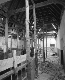 Interior. View of main byre showing roof structure and stalls