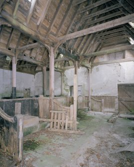 Interior. View of main byre showing roof structure and stalls