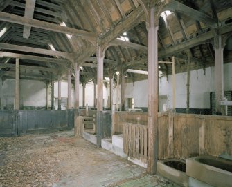 Interior. View of main byre showing roof structure and stalls