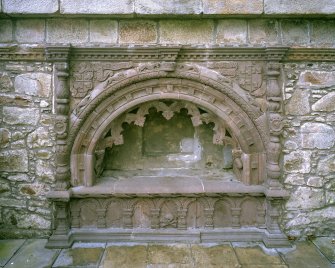 View arched altar tomb from N with initials "WF" at left and "EG" at right for William Forbes of Tolquhon and Elizabeth Gordon
