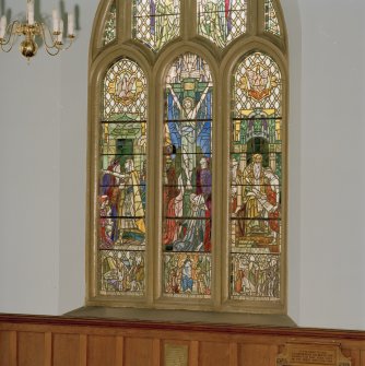 Interior. Chancel stained glass window of the cruxifiction by Douglas Strachan 1924