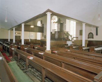 Interior. View from NW underneath the gallery looking towards the pulpit