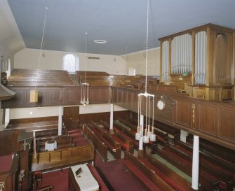 Interior. View from E from the gallery showing the organ and gallery