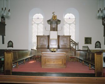 Interior. Axial  view from N of the pulpit and communion table