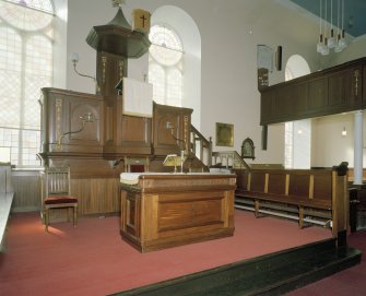 Interior. View from NE showing the pulpit and communion table