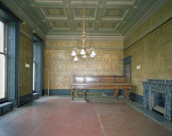 Interior. Dining room View from W showing fireplace, original chandelier and original sideboard