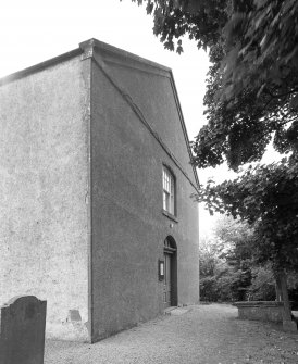 W gable from NNW showing entrance and pediment