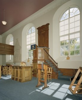 Interior.  Pulpit and flanking windows from NW