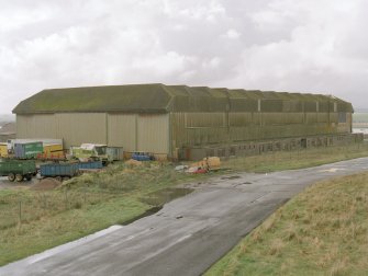 View from NE of southwestern C1 type hangar showing disabled doors at E end.