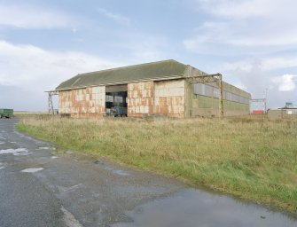 View from S of the northeastern C1 type hangar showing door gantries and doors.