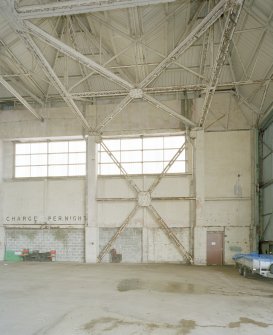 Interior view of southwestern C1 type hangar showing steel roof framing and additional steel support for door area.