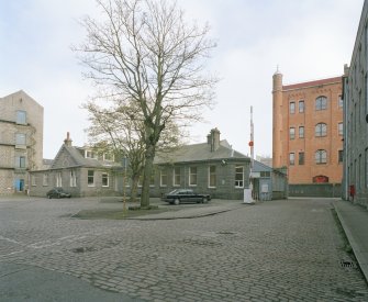 View of offices and gatehouse from NW