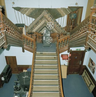 Interior. Elevated view of N wing  former Bishop's Palace  main stair from ESE