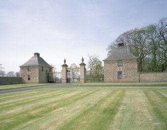 View of East Lodge and gates from E