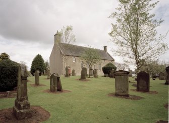 View from SW showing setting in graveyard