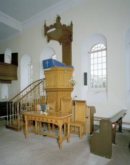 Interior, detail of pulpit and communion table