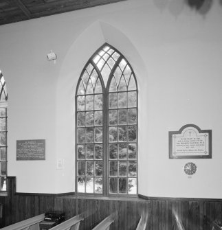 Interior. Detail of clear glazed pointed arch window