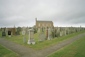 View from S showing setting in graveyard