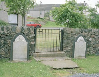 Detail of N gate and Campbell Family gravestones