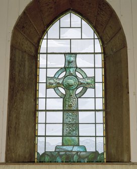 Interior. E window stained glass depiction of Kildalton Cross designed by George G Kirk of Glasgow and gifted by Commander J R C Montgomery