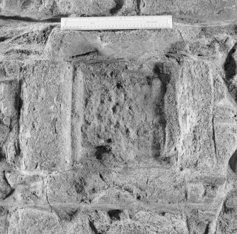 Panel in outer face of N wall
