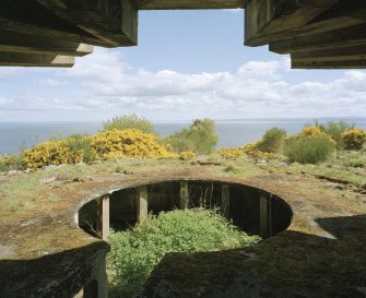 View from W showing gun-pit of S emplacement and part of the canopy.