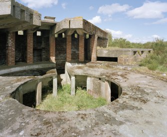 View from SE showing gun-pit of S emplacement with service corridor and  part of the canopy