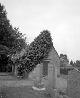 View of building in South corner of graveyard from North West