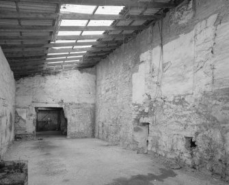 Interior.  View from SW in lean-to area at the NE side of the warehouse building ('Room 4')