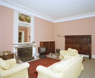 Interior, view of drawing room from West showing Jansen designed fireplace and overmantle