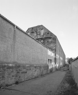 Oblique general view from NE along NW side of maltings