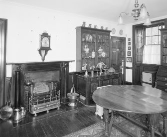 Interior, view of ground floor hall from North West showing black marble fireplace c.1820